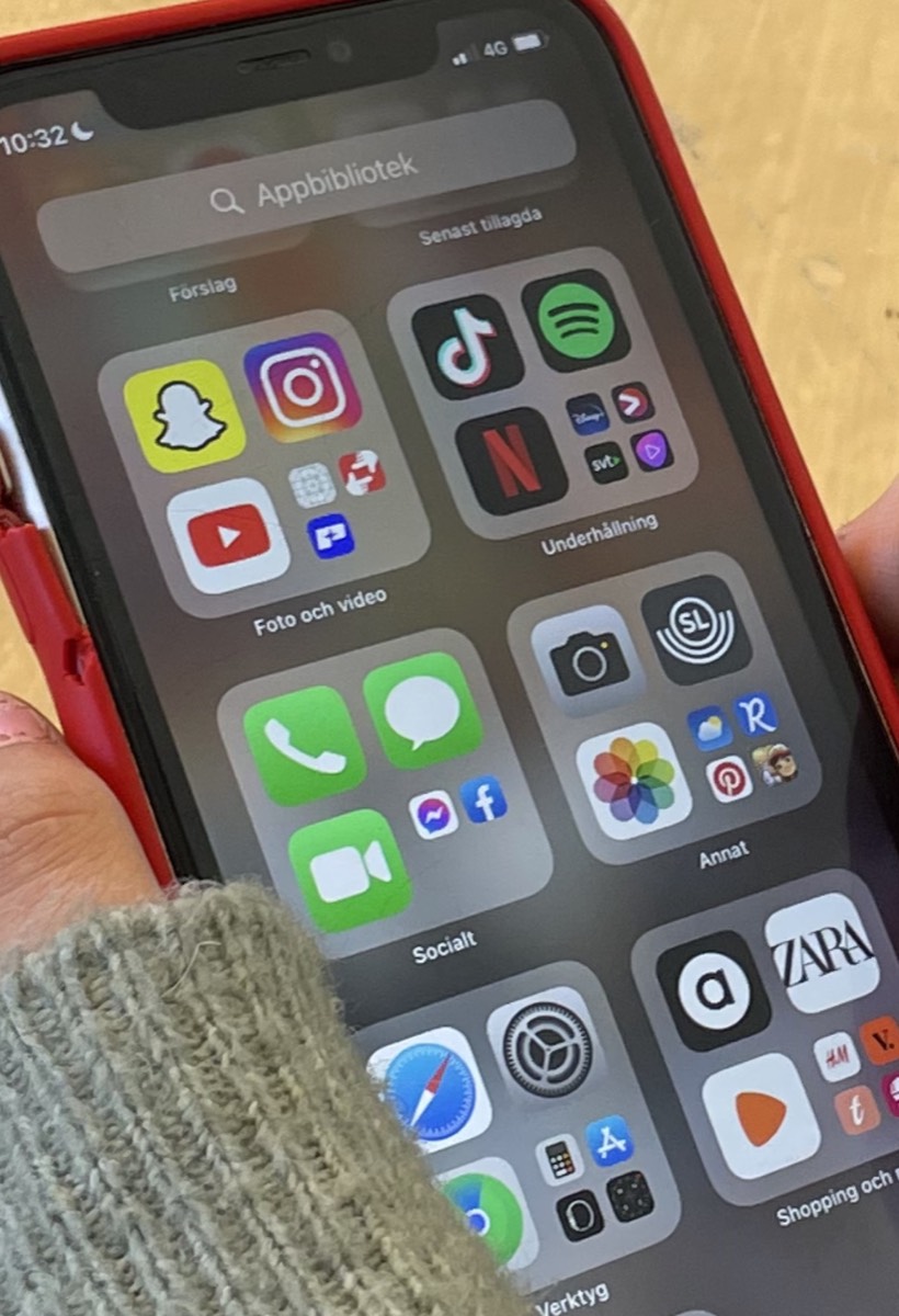 A smartphone home screen showing social media apps